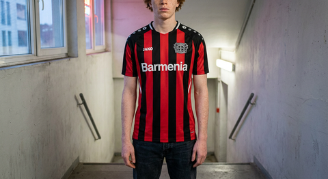 AI recreation of the Bayer Leverkusen home 2021/22 shirt, generated by Kitlist from its documented design record.
