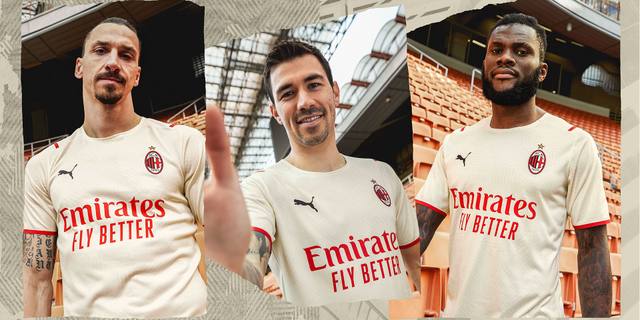 AC Milan players Zlatan Ibrahimović, Alessio Romagnoli, and Franck Kessié model the 2021/22 away shirt in a promotional campaign image.