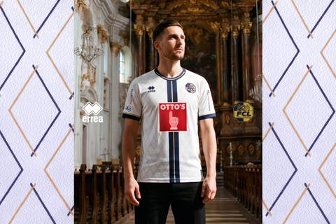FC Luzern away shirt from Erreà presented in a church setting