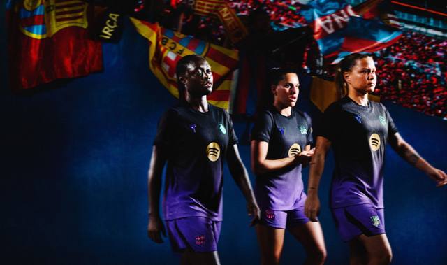 Three FC Barcelona players wearing the black and purple Kobe x FC Barcelona away shirt during a campaign shoot.