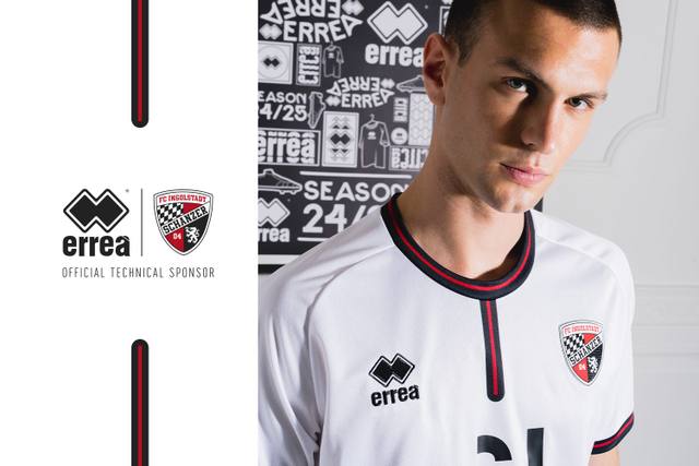 A model presents the FC Ingolstadt 04 2024/25 away shirt by Errea.