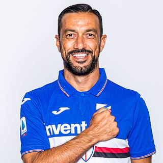 A portrait of a player wearing the U.C. Sampdoria 2019/20 home shirt during a studio shoot.