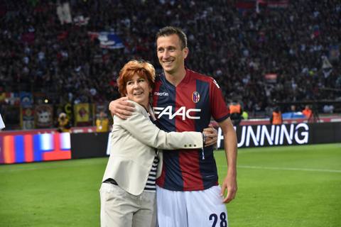 Bologna FC player wearing the 2016/17 home shirt during its presentation on the pitch.