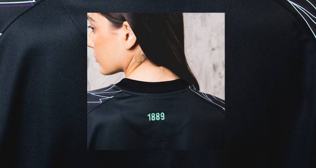 A close-up detail of the upper back of the Sheffield United 2024/25 away shirt, featuring the embroidered founding year '1889'.