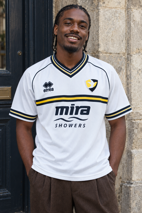 AI recreation of the Cheltenham Town FC away 2025/26 shirt, generated by Kitlist from its documented design record.