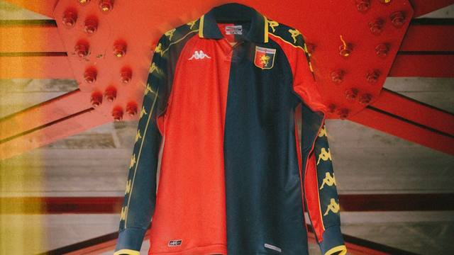 A front view of the Genoa CFC 2023/24 fourth shirt hanging against a red metal structure.
