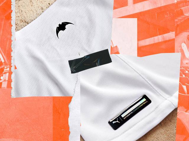 Detail shots of the Valencia CF 2021/22 home shirt, showing the bat logo on the upper back and the Puma authentic license badge on the hem.